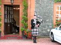 Jim Moffat playing outside the Moffat House Hotel